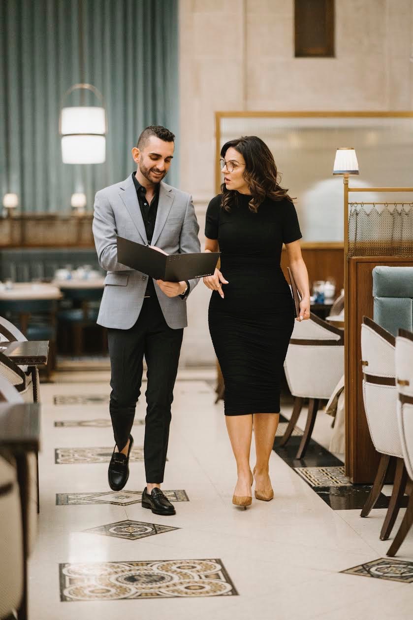 Casey and Matthew reviewing details